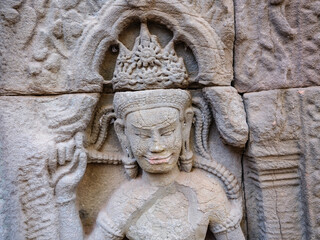 Obraz premium Wat Nokor temple stone engraving, Cambodia