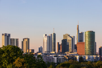 Fototapeta premium Frankfurt am Main skyline with modern skyscrapers and residential buildings at sunset, Niederrad, Hessen, Germany