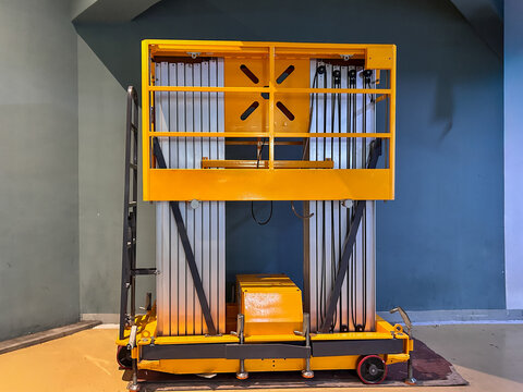 Double mast aluminum aerial work platform designed for vertical access in indoor environments. Commonly used for maintenance, installation, and inspection tasks.