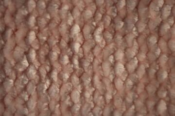 macro texture of soft pink plush fabric. Close-up of cozy textile with delicate fibers and warm pastel tones. Smooth, soft surface creates a calm and comfortable background perfect for fashion, home d © Анна Климчук