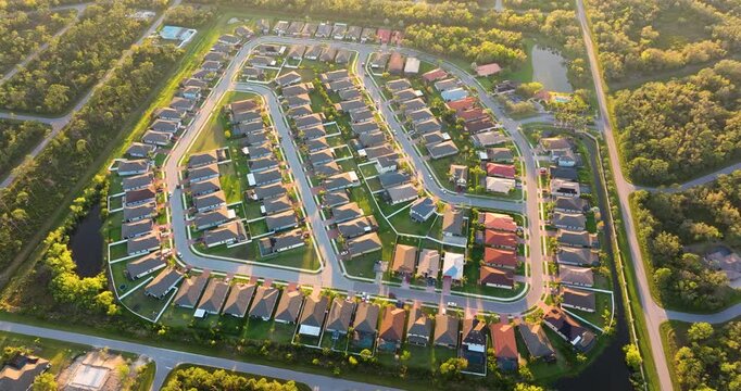 Aerial view of expensive residential houses in small town in southwest Florida. American dream homes as example of real estate development in US suburbs.