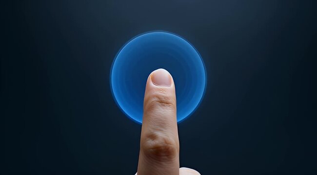 Single finger touching a glowing blue circular touchscreen button or interface
