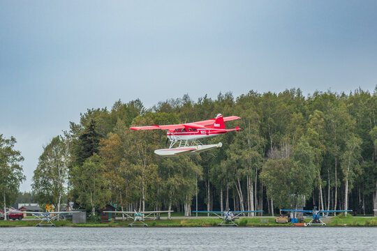 Rust Flying Service based out of Anchorage, Alaska is coming in for a landing on Lake Hood. 