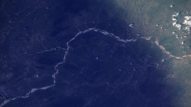 Sunrise timelapse over Wadi Azum Darfur Sudan satellite view from space based on Nasa imagery