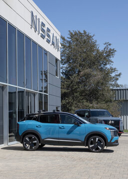 Nissan Kicks SR AWD Crossover SUV at a dealership. Nissan offers the Kicks with a 2.0L DOHC 4-Cylinder engine. MY:2026