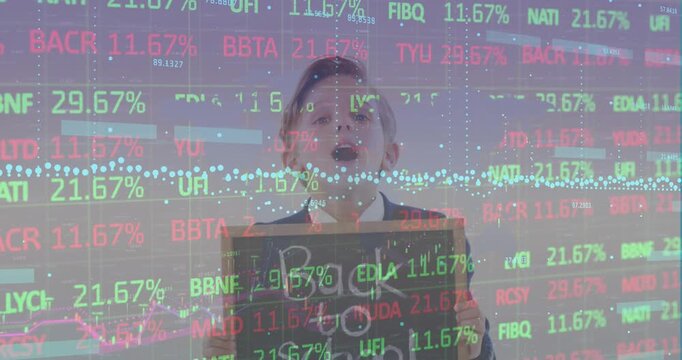 A schoolboy holding a chalkboard with the text back to school