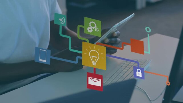 Male executive engrossed in work on a tablet at his modern office desk.