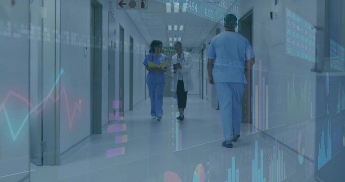 Entering hospital hall, senior doctor using tablet and nurse carrying folder showing data overlays