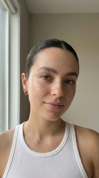 Young Woman with Natural Glowing Skin for Beauty Bloggers and Skincare Experts Showcasing Fresh Minimalist Aesthetic and Clean Face Look
