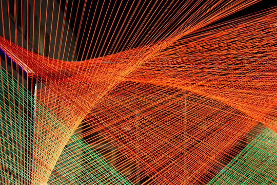 Colorful lines create patterns in the night sky
