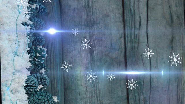 Animation of light moving over pine cones on wooden surface