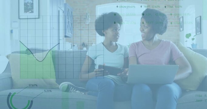 Animation of stock market data processing over african american mother and daughter using laptop
