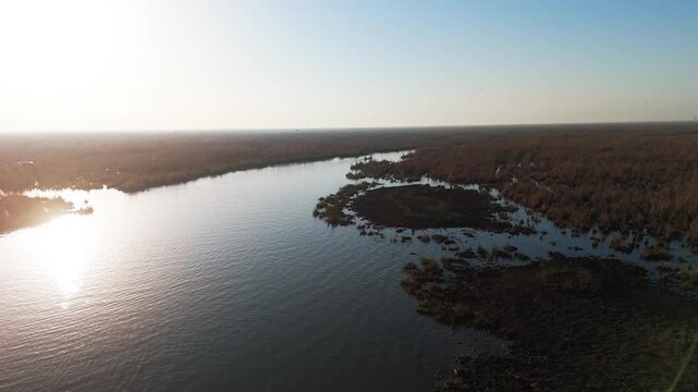 The Al-Jubaysh Marshes, located in Dhi Qar, Iraq, are part of the Mesopotamian marshlands, one of the world's largest wetland ecosystems. Known for their rich biodiversity, these marshes are home to u