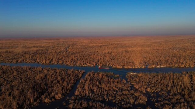 The Al-Jubaysh Marshes, located in Dhi Qar, Iraq, are part of the Mesopotamian marshlands, one of the world's largest wetland ecosystems. Known for their rich biodiversity, these marshes are home to u
