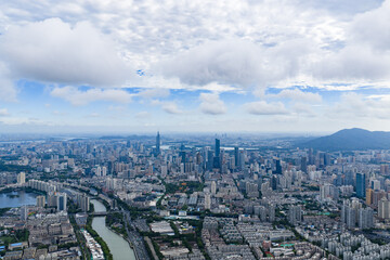 Fototapeta premium Aerial view of modern city with blue sky