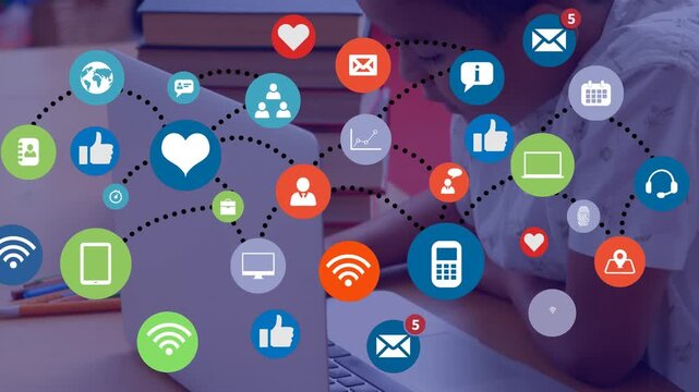Network of digital icons against hispanic boy using laptop in the class at school