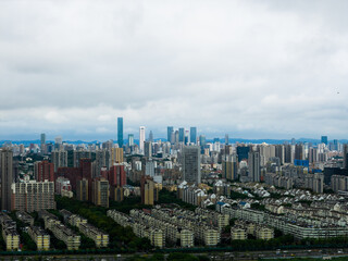 Obraz premium Aerial view of modern city with blue sky