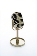 Fototapeta premium Retro microphone isolated on white background . Classic vintage silver microphone on a clean white background for audio recording