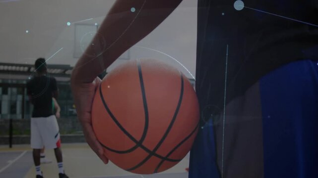 Basketball being visualized as 3D render on outdoor court, with light blue arcs and circles