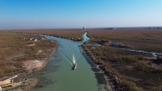 The Al-Jubaysh Marshes, located in Dhi Qar, Iraq, are part of the Mesopotamian marshlands, one of the world's largest wetland ecosystems. Known for their rich biodiversity, these marshes are home to u