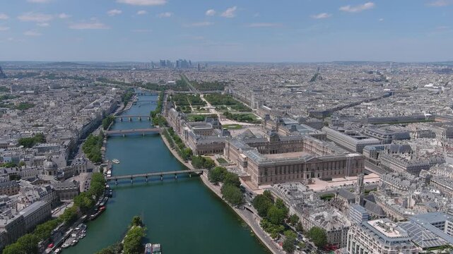 Aerial view of Louvre Museum in Paris, famous art museum in historic centre of city, river Seine - landscape panorama of France, Europe