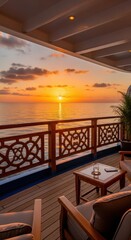 Obraz premium Golden sunset illuminates the calm ocean seen from a luxury cruise ship balcony.
