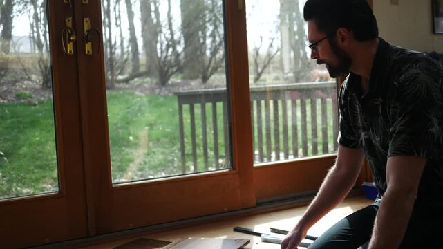 Building Desk Series - Man Confused at Project or is Missing Piece.