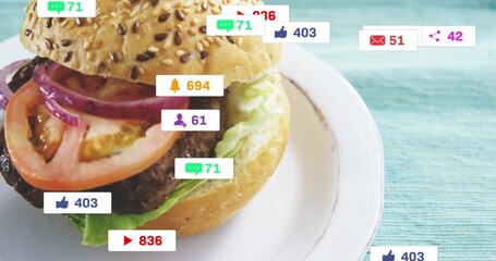 Showing sesame bun burger with lettuce and patty on plate at turquoise mat, badges overlaying © vectorfusionart