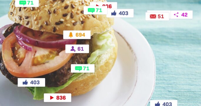 Showing sesame bun burger with lettuce and patty on plate at turquoise mat, badges overlaying