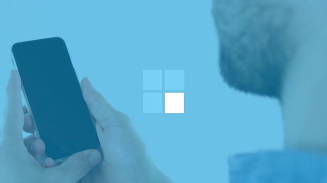 Male user tapping lower phone, initiating cycling 2x2 tile animation, demonstrating app loading
