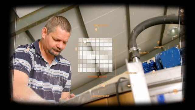 Technician placing hands on handle and stirring vat for processing while HUD graphics monitoring