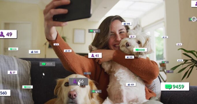 Woman extending arm holding phone recording selfies hugging dog growing social media overlays