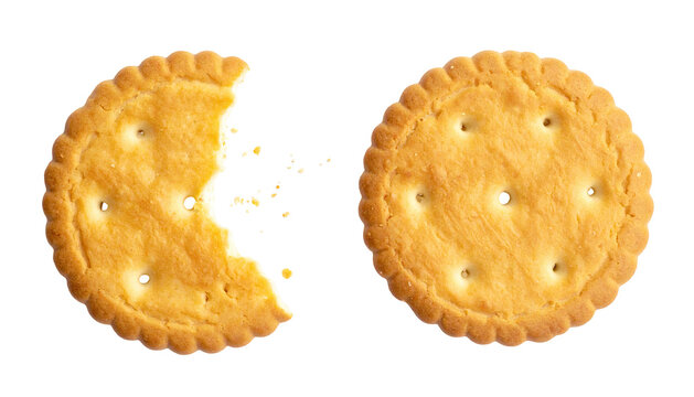 Golden round cracker with a missing bite and crumbs isolated on black background close-up of crispy baked snack for healthy diet