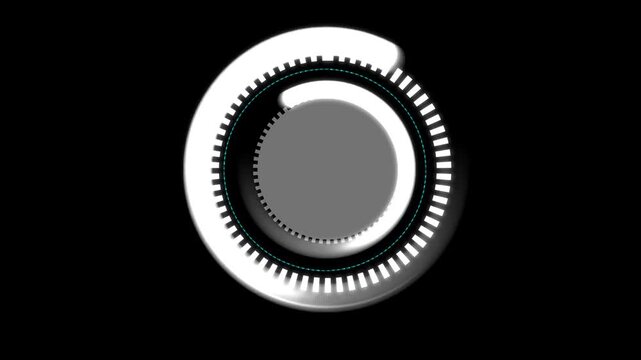 Close-up of a metallic circular dial with gear teeth and knob on a black background.