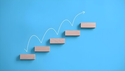 Fototapeta premium Wooden blocks arranged as steps with an upward arrow on a blue background, symbolizing progress and growth.