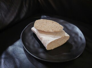 bread and butter Raw Tempeh gembos or Tempeh gembus  or Tempeh gajes or Tempeh menjes is a fermented tofu pulp dregs Traditional javanese food.Traditional Indonesian food © yulia11