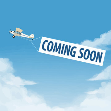 Airplane pulling coming soon sign in sky.