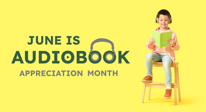 Cute little Asian boy in headphones listening to audiobook with book and sitting on stool against yellow background