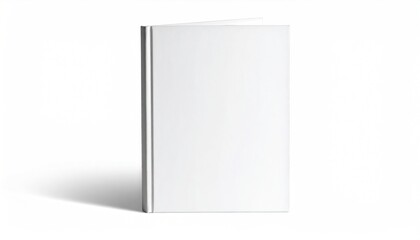 A partially opened book with white covers casts a shadow on a white background