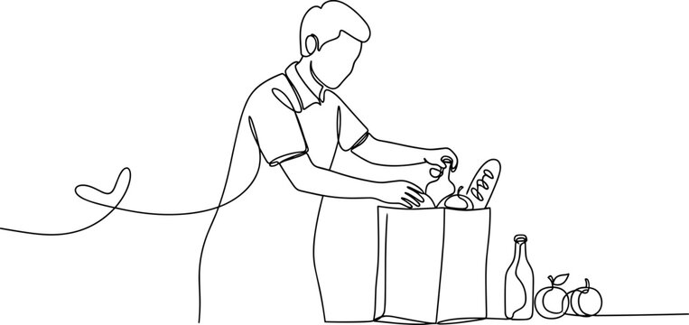 Man opening a cardboard box.