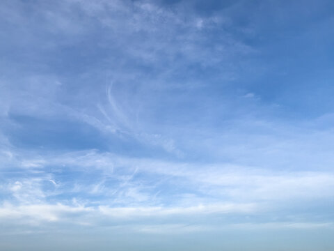 Wispy Clouds in a Blue Sky