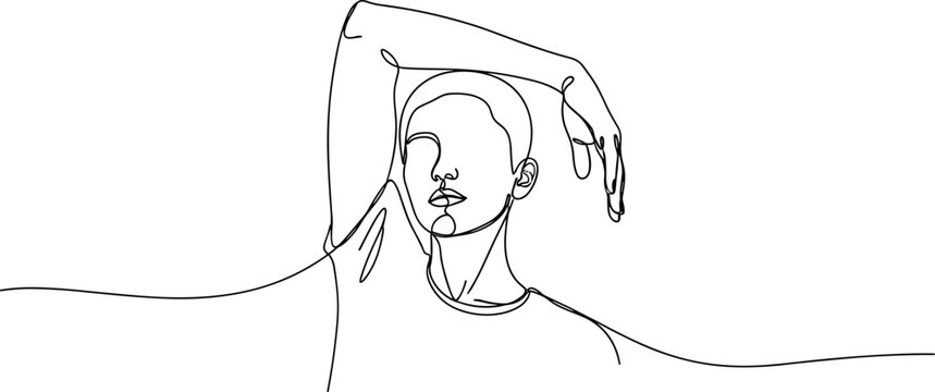 Woman stretching her left arm up.