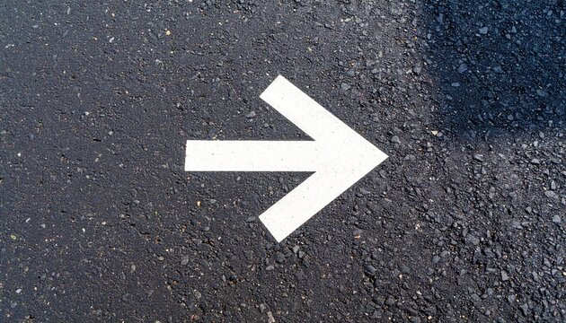 White arrow right asphalt road marking
