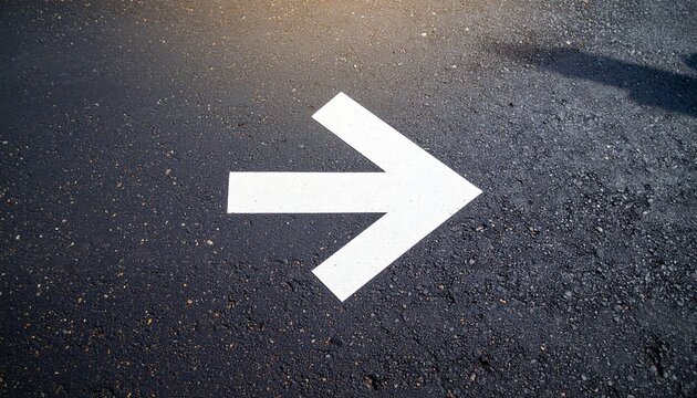 White arrow right asphalt road marking