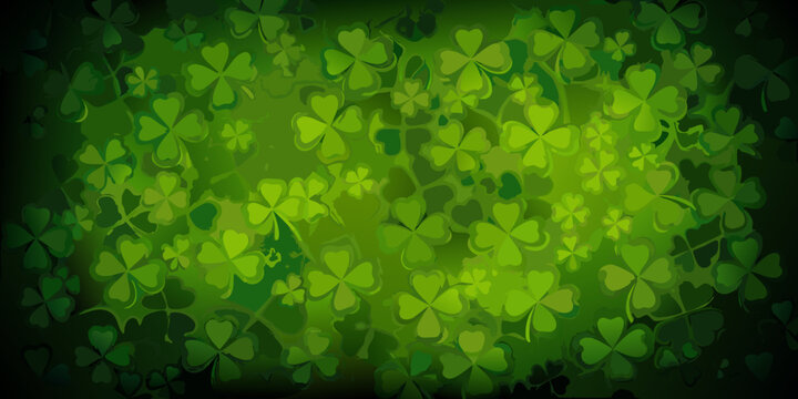 A vibrant textured background of numerous overlapping four leaf clovers