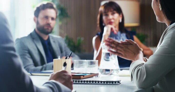 Woman, hands and discussion with team in meeting for merger plan, integration review or acquisition. Directors board, speaker or feedback in office for market expansion, fairness opinion or valuation