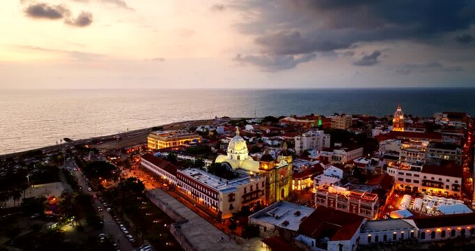 Sunset aerial view of illuminated Santuario de San Cedro claver in Cartagena