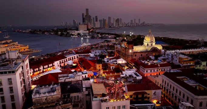 Cartagena Centro historic Old Town and Bocagrande in back at twilight, aerial