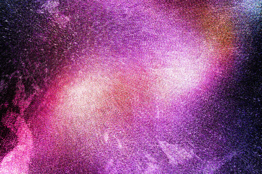 Black dark indigo blue gold orange glitter shiny abstract background for design. Twinkling glow stars effect. Fantastic, fantasy. Like outer space, night sky, universe. Grain, rough surface.