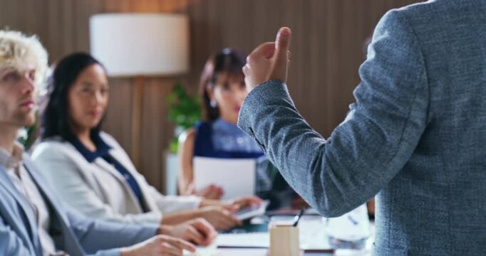 Speaker, hands and meeting with team in boardroom for financial review, market expansion or update. Directors board, people and presentation in office for merger plan, goal setting or risk management